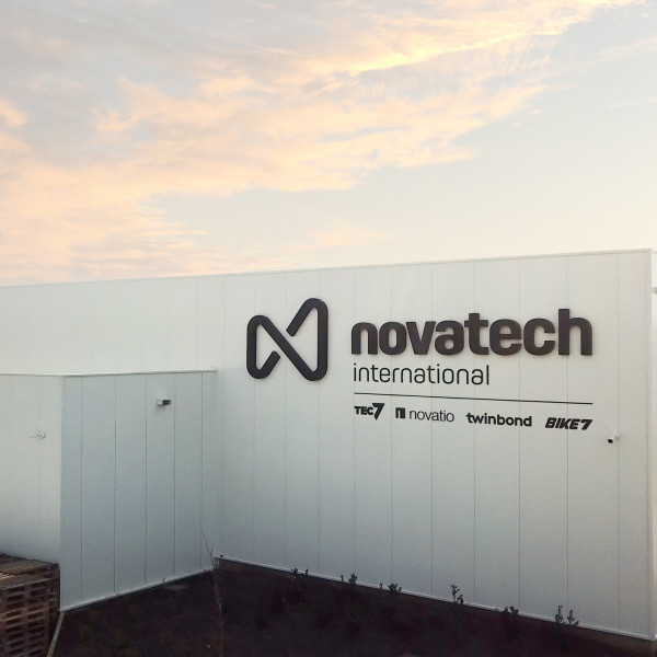 Logo of Novatech on building
